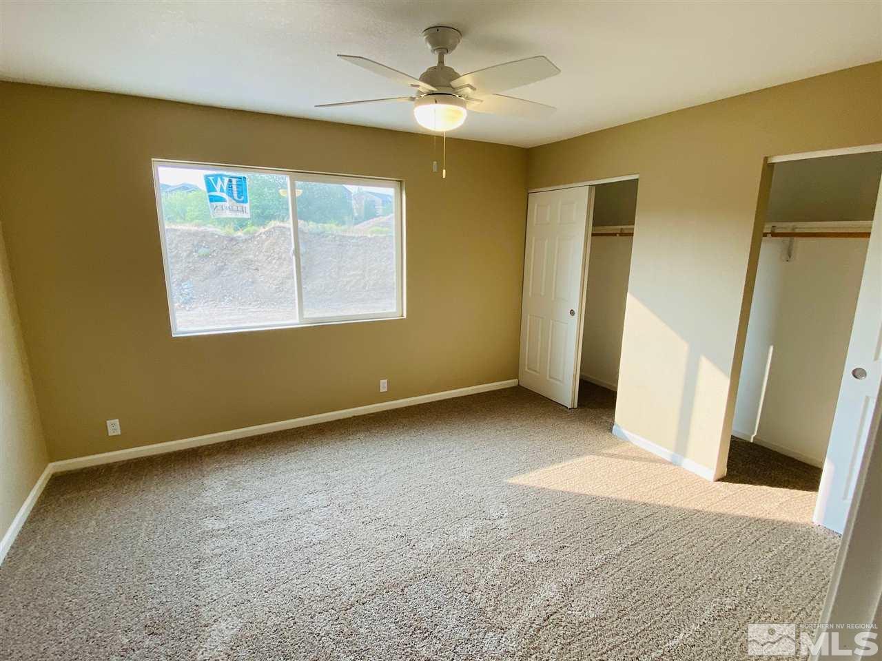 3899 Allen Glen Drive Reno, NV 89503 - Photo 7 of 13 a view of an empty room with a window