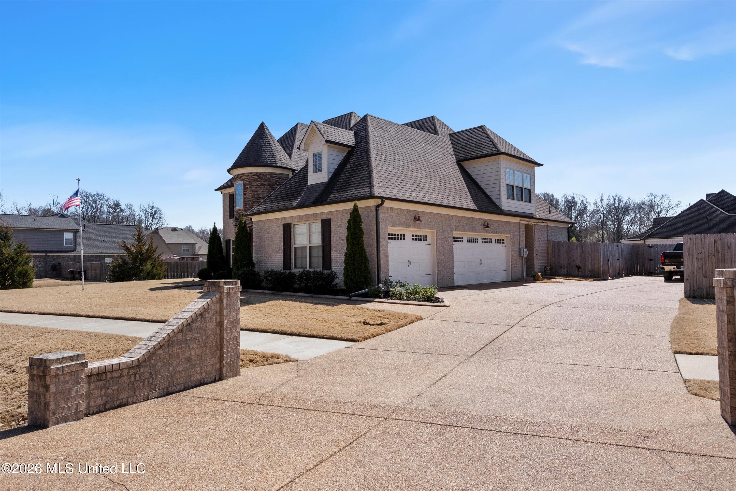 1586 Carlee Drive Hernando, MS 38632 - Photo 4 of 44 1586-side elevation