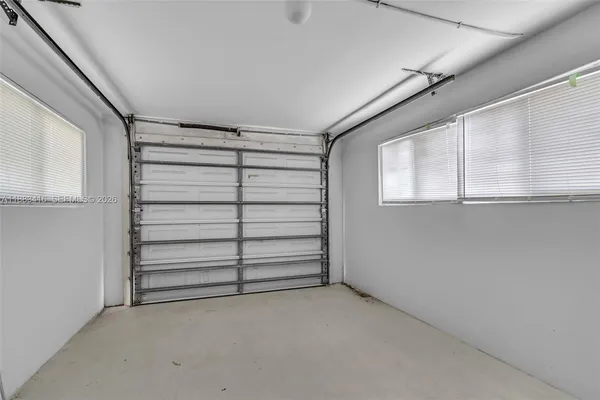 a view of closet area with empty racks