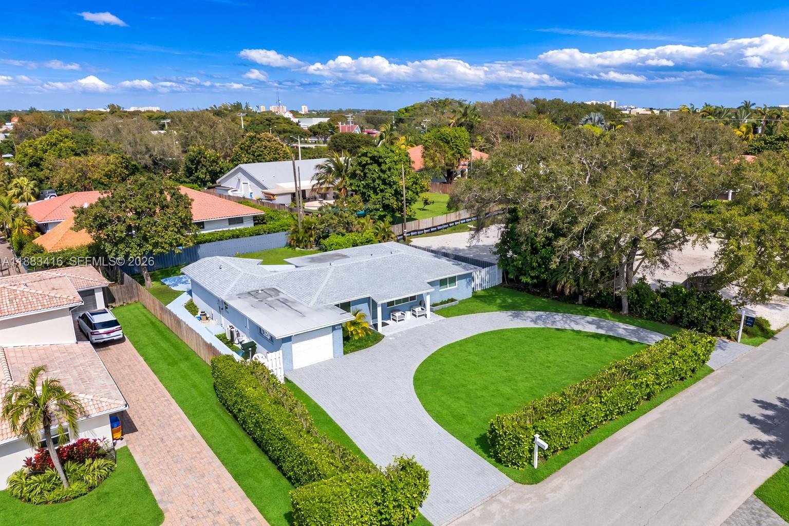 465 Northwest 11th Street Boca Raton, FL 33432 - Photo 41 of 50 an aerial view of a house with a garden