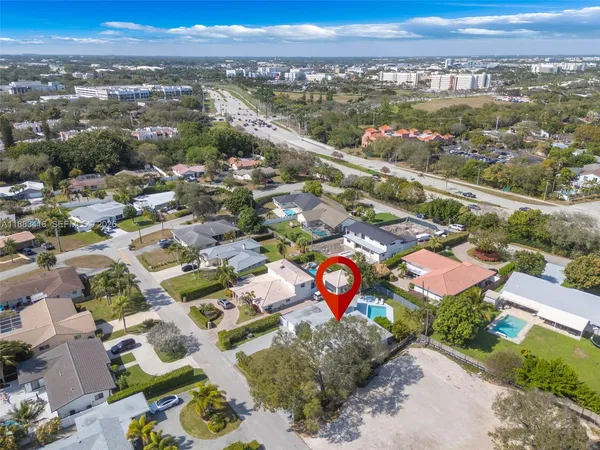 an aerial view of a city with lots of residential buildings