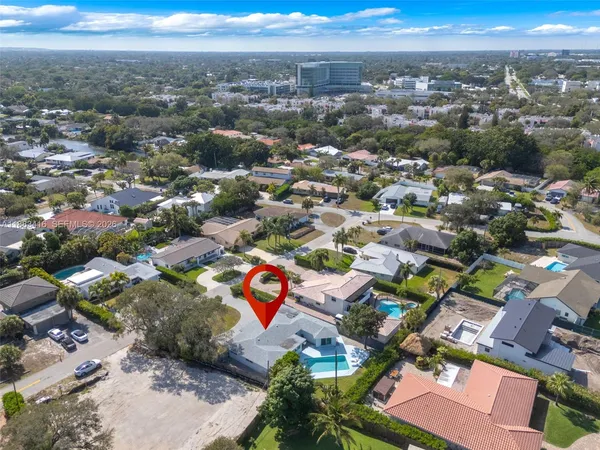 an aerial view of a city with lots of residential buildings