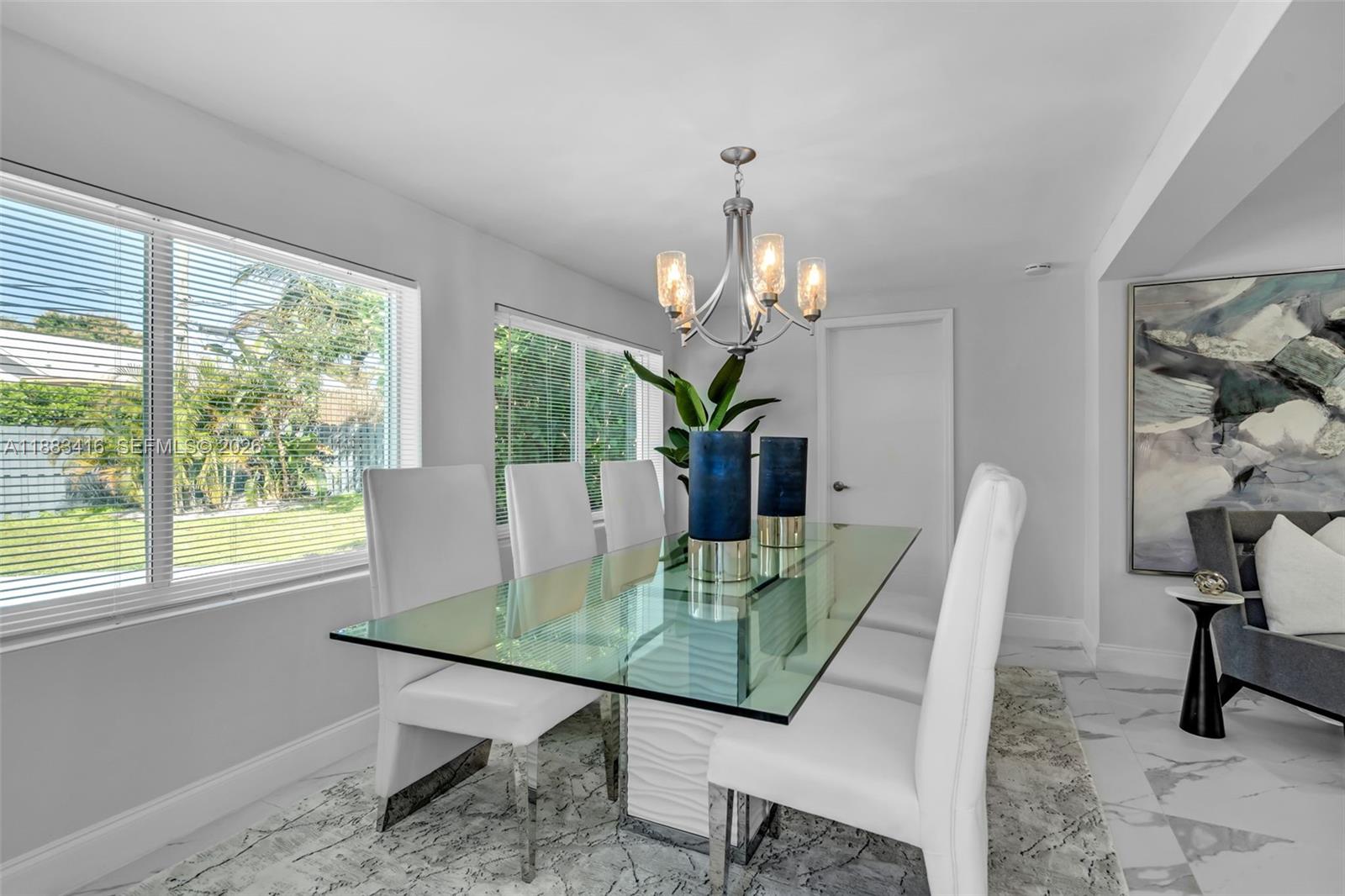465 Northwest 11th Street Boca Raton, FL 33432 - Photo 6 of 50 a dining room with furniture and window