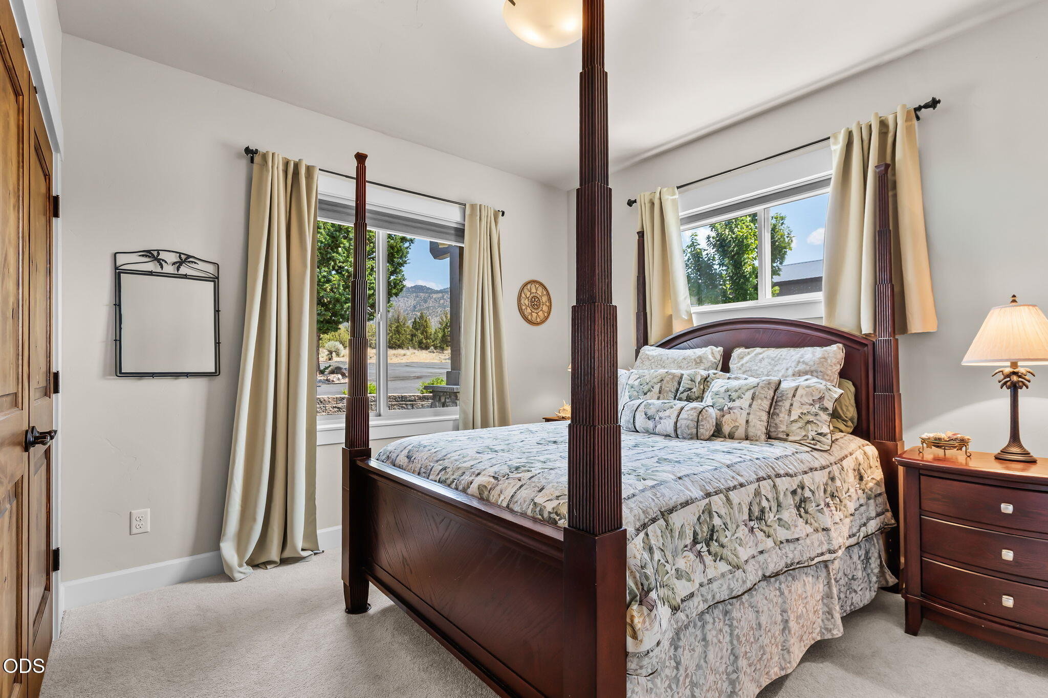 13601 Southwest Harrison Way Powell Butte, OR 97753 - Photo 26 of 81 a bedroom with a bed and a window
