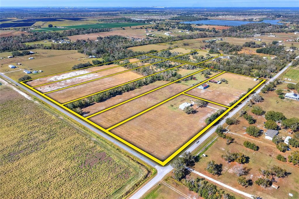 16302 Colding Loop Wimauma, FL 33598 - Photo 2 of 10 an aerial view of residential houses with outdoor space