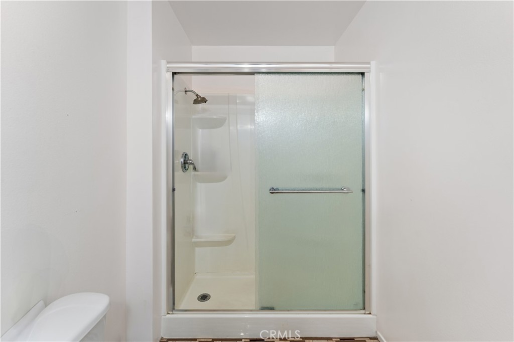 14802 Newport Avenue, Unit 18A Tustin, CA 92780 - Photo 18 of 27 a bathroom with a shower