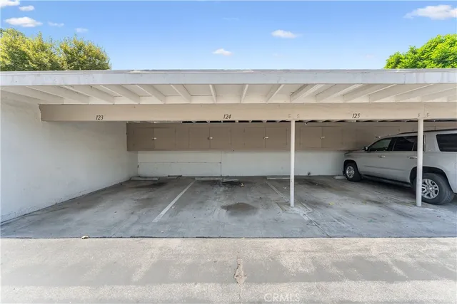 an aerial view of residential houses with city view