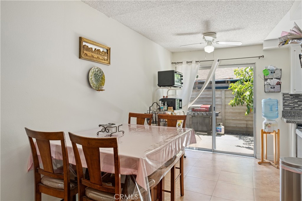 14802 Newport Avenue, Unit 18A Tustin, CA 92780 - Photo 5 of 27 a view of a dining room and livingroom