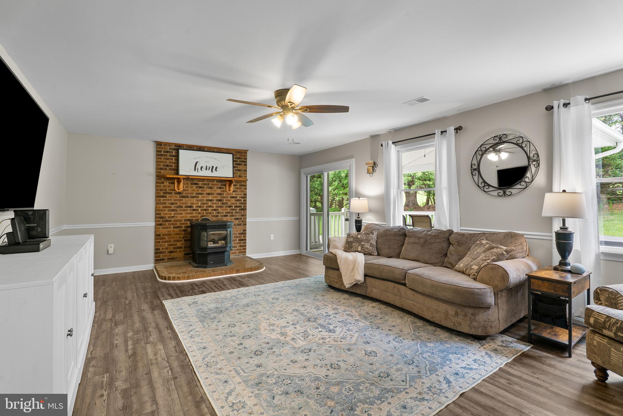 2607 Marston Road New Windsor, MD 21776 - Photo 9 of 45 Family room w/pellet stove/brick hearth