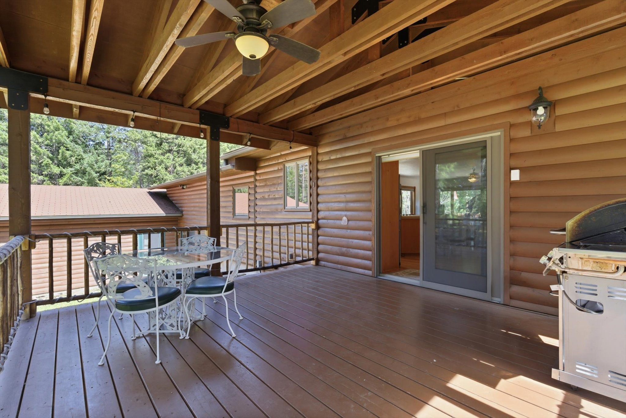 176 Blaine Ridge Road Kalispell, MT 59901 - Photo 9 of 45 Large,covered deck off the kitchen