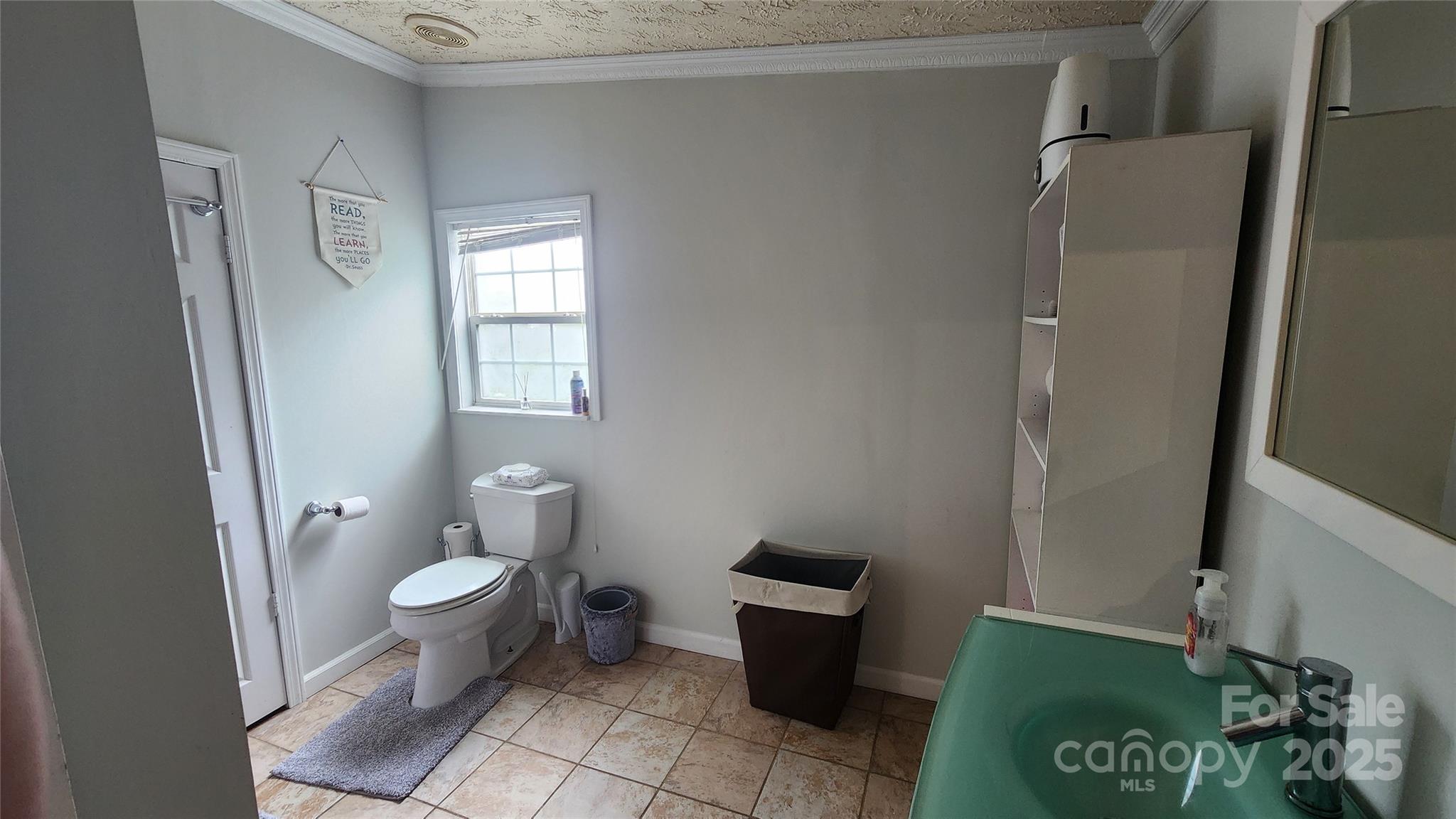 1235 Sulphur Springs Road Waynesville, NC 28786 - Photo 21 of 40 a bathroom with a toilet and a shower