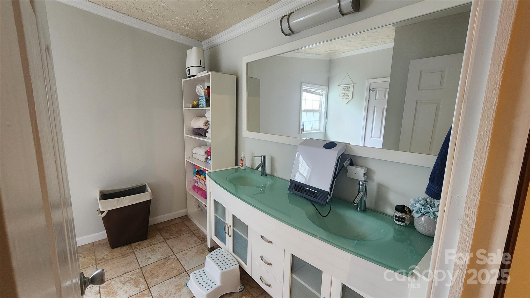 1235 Sulphur Springs Road Waynesville, NC 28786 - Photo 28 of 40 a bathroom with a granite countertop sink and a mirror
