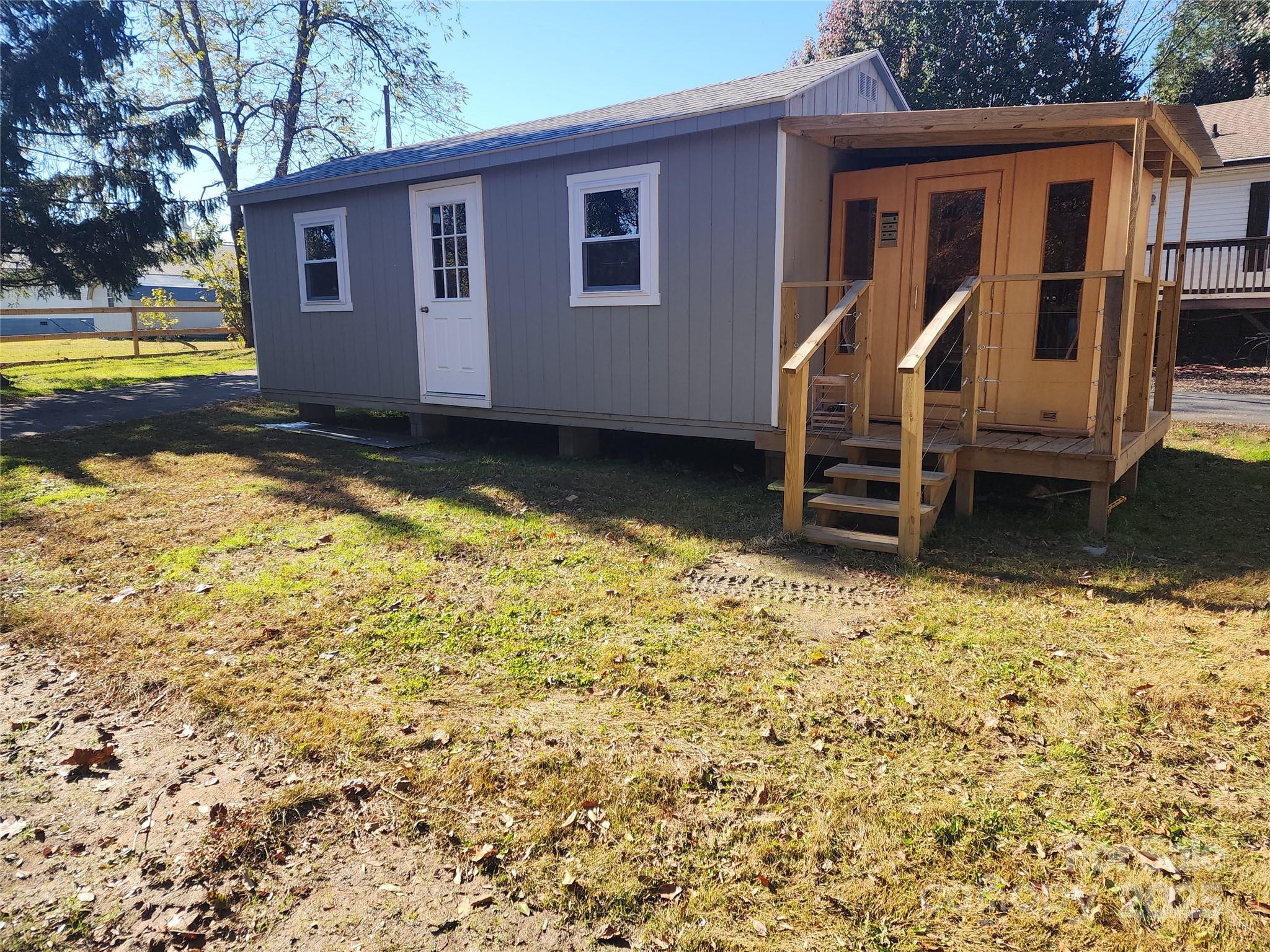 1235 Sulphur Springs Road Waynesville, NC 28786 - Photo 31 of 40 a view of house with backyard and swimming pool