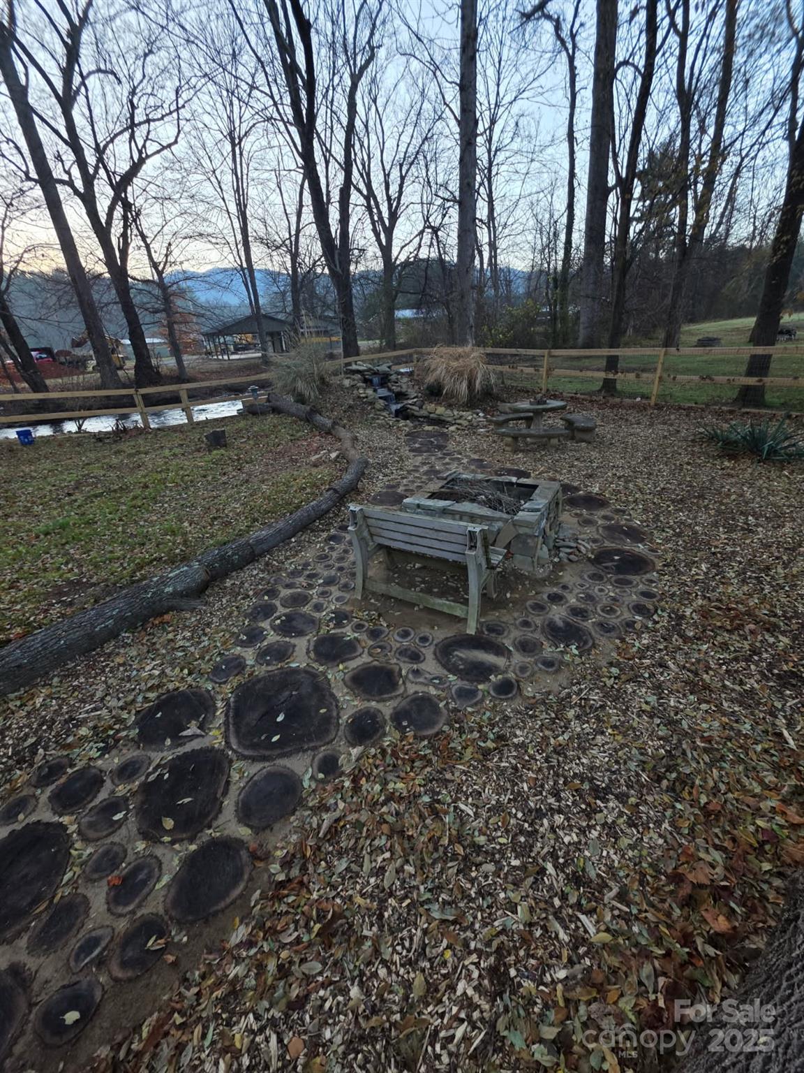 1235 Sulphur Springs Road Waynesville, NC 28786 - Photo 39 of 40 a backyard of a house with lots of green space
