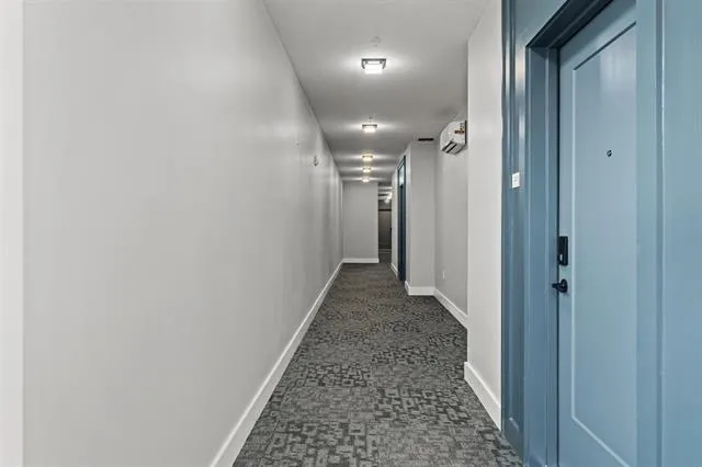 a kitchen with a sink stainless steel appliances and cabinets