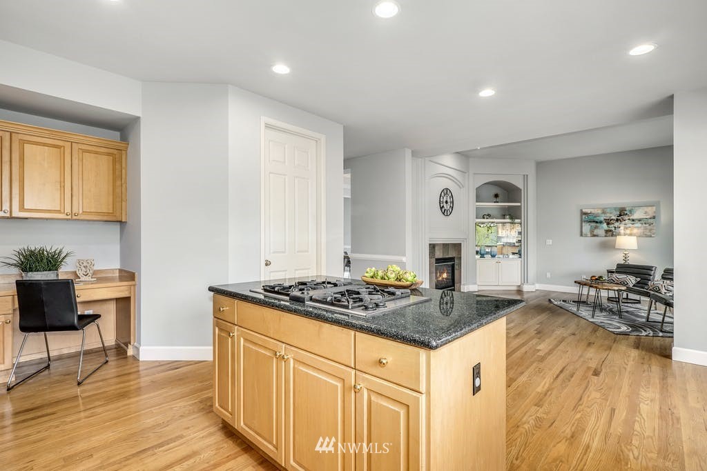 3620 209th Place Southeast Bothell, WA 98021 - Photo 13 of 31 a kitchen with stainless steel appliances granite countertop a stove and white cabinets