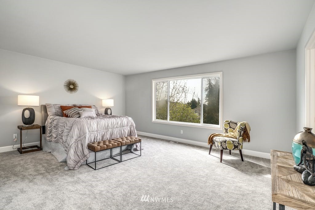3620 209th Place Southeast Bothell, WA 98021 - Photo 14 of 31 a bed room with a bed and a chair