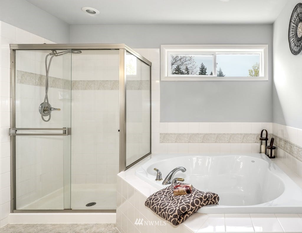 3620 209th Place Southeast Bothell, WA 98021 - Photo 18 of 31 a bathroom with a tub and a shower