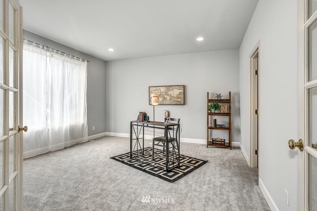 3620 209th Place Southeast Bothell, WA 98021 - Photo 23 of 31 a view of wooden floor and furniture in a room