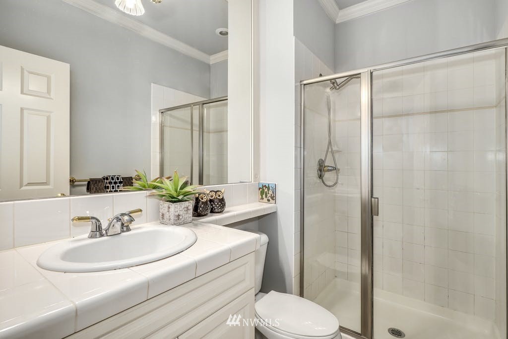 3620 209th Place Southeast Bothell, WA 98021 - Photo 24 of 31 a bathroom with a sink toilet and shower