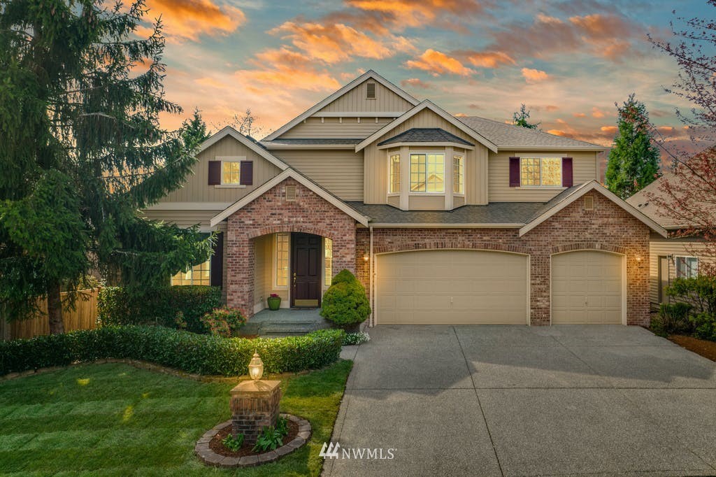 3620 209th Place Southeast Bothell, WA 98021 - Photo 31 of 31 a front view of a house with a garden and plants