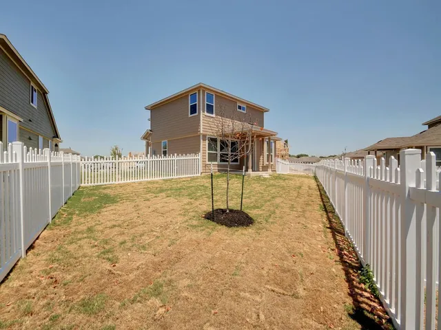 a swimming pool with a yard