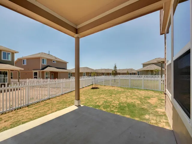 a view of a swimming pool with a chair