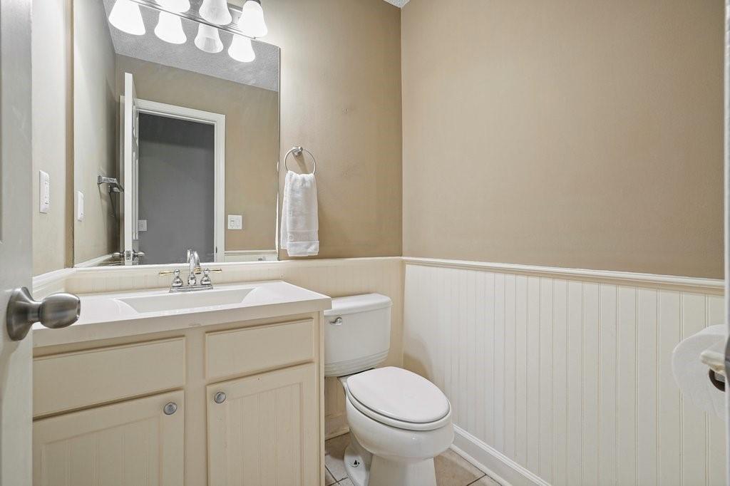 7335 Lytham Trace Cumming, GA 30041 - Photo 19 of 45 a bathroom with a sink and a toilet