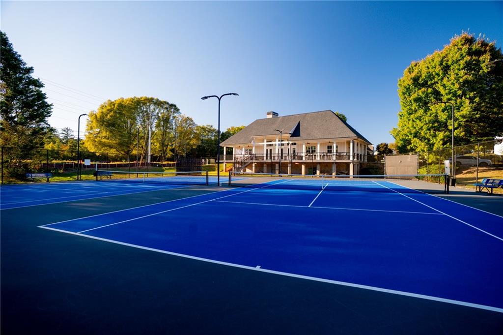 7335 Lytham Trace Cumming, GA 30041 - Photo 38 of 45 a front view of a house with swimming pool