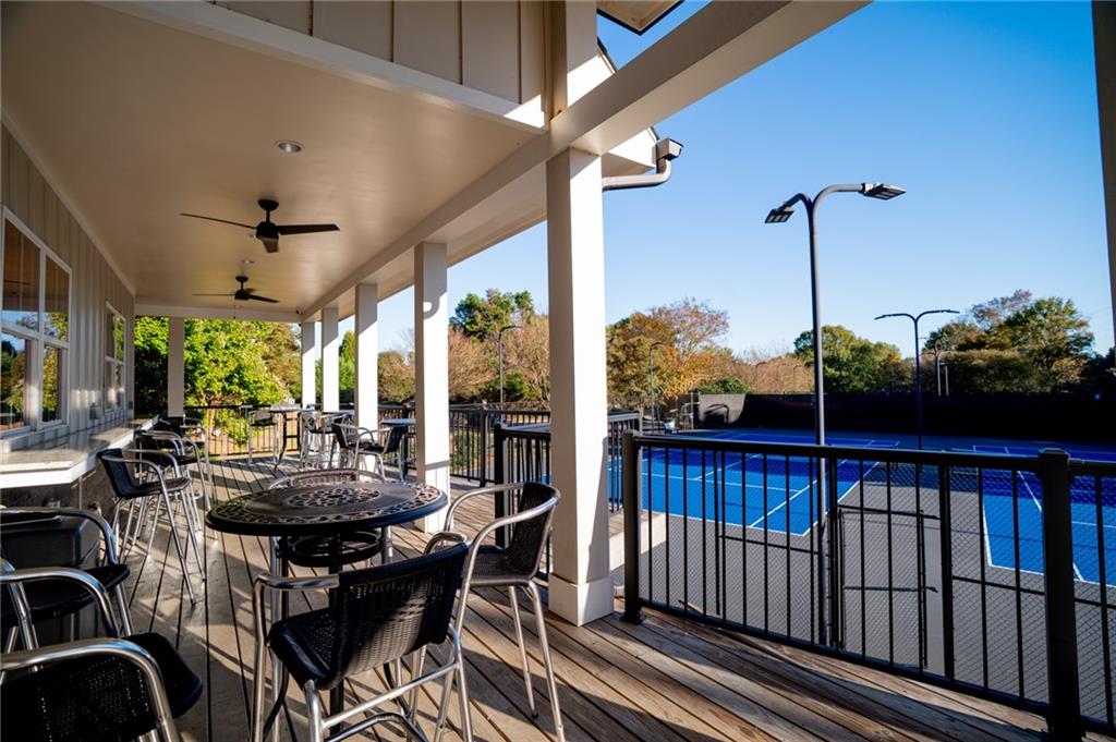 7335 Lytham Trace Cumming, GA 30041 - Photo 39 of 45 a view of a dining room with furniture window and outside view