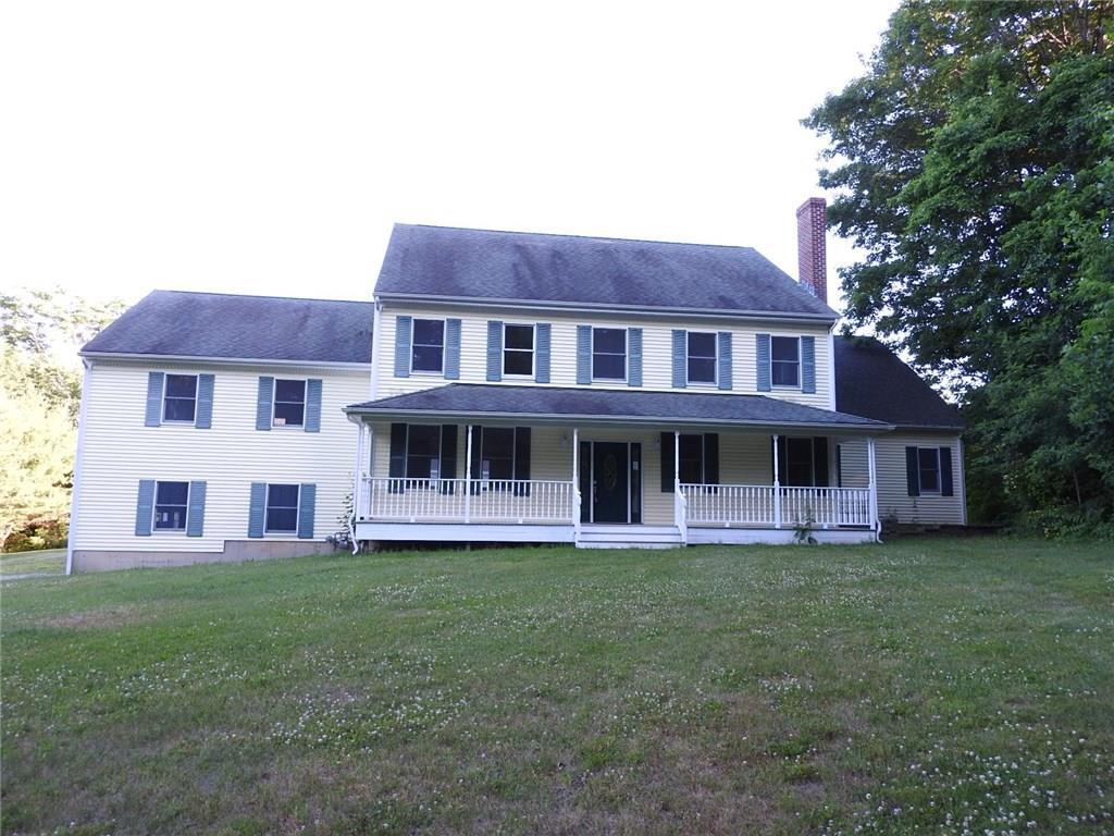 121 Overbrook Road Madison, CT 06443 - Photo 1 of 1 a view of a yard in front of a house with a large tree