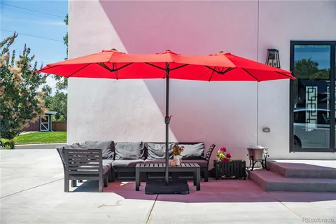 a living room with furniture and a table