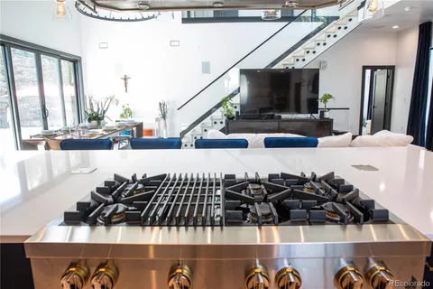 a kitchen with a stove and cabinets