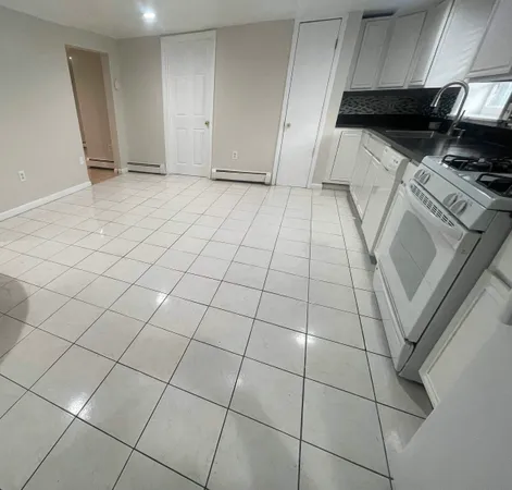 a view of a kitchen with the sink