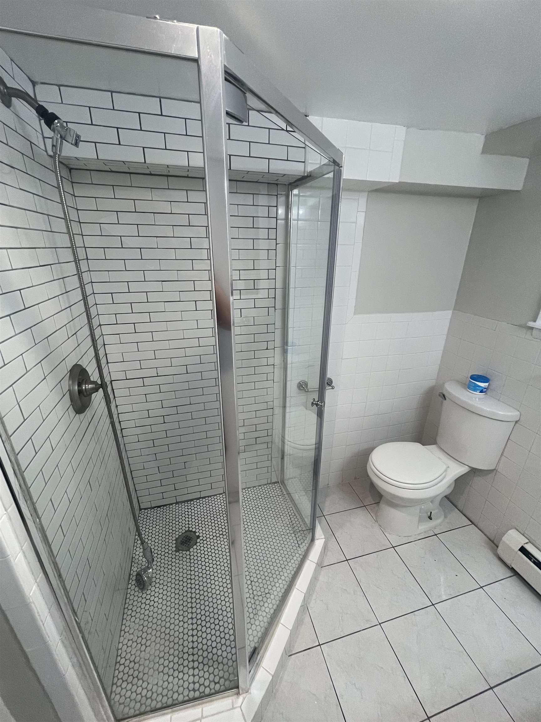 171 Charles Street, Unit 2 Secaucus, NJ 07094 - Photo 8 of 11 a bathroom with a toilet and a shower