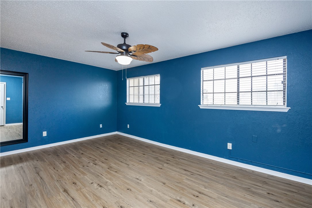 3052 Quail Springs Road, Unit A2 Corpus Christi, TX 78414 - Photo 19 of 31 a view of an empty room with a window