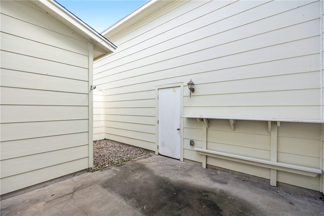 3052 Quail Springs Road, Unit A2 Corpus Christi, TX 78414 - Photo 28 of 31 a view of garage