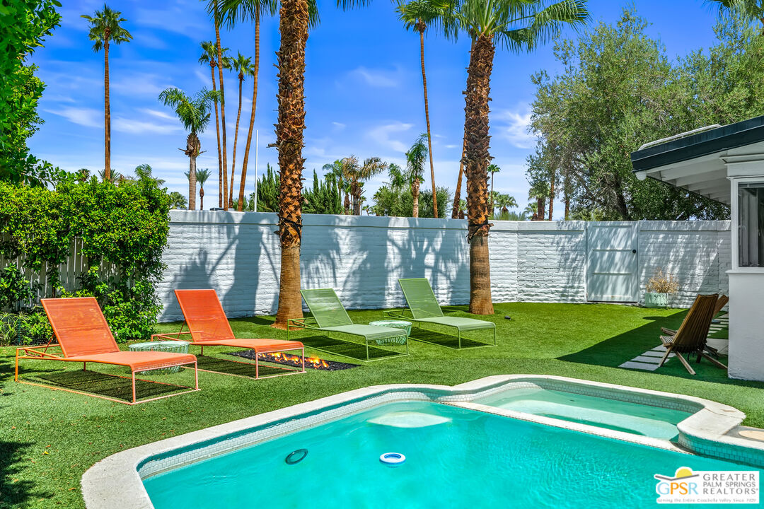 1655 Tamarisk Road Palm Springs, CA 92262 - Photo 30 of 39 a garden view with a sitting space