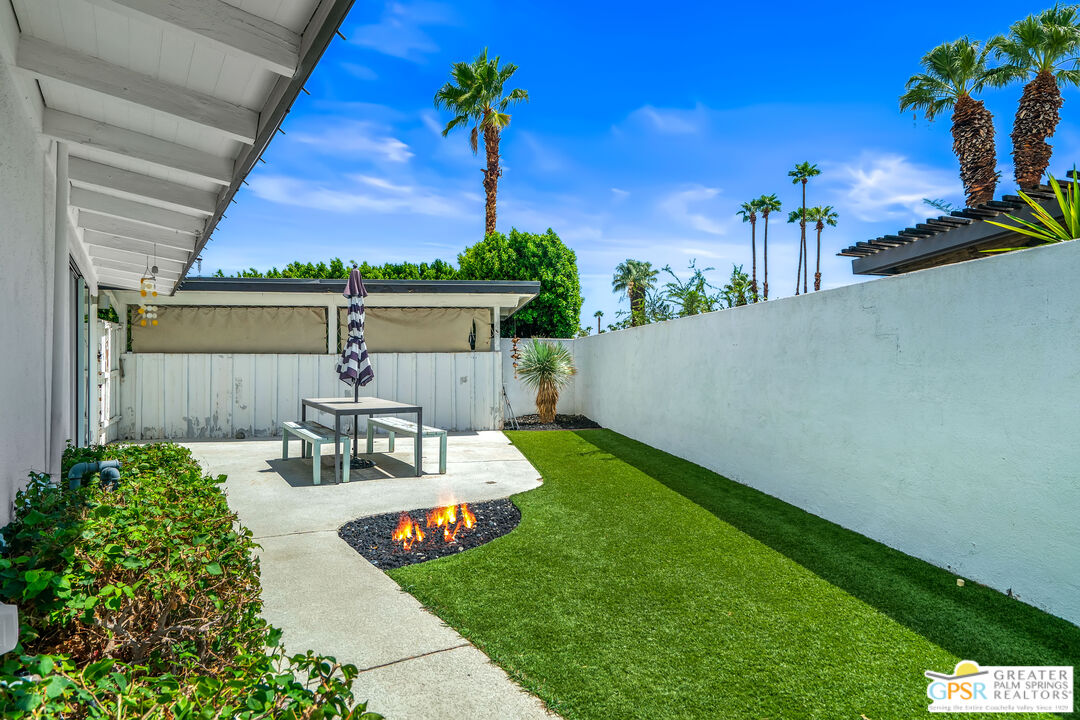1655 Tamarisk Road Palm Springs, CA 92262 - Photo 34 of 39 a view of a backyard with sitting area