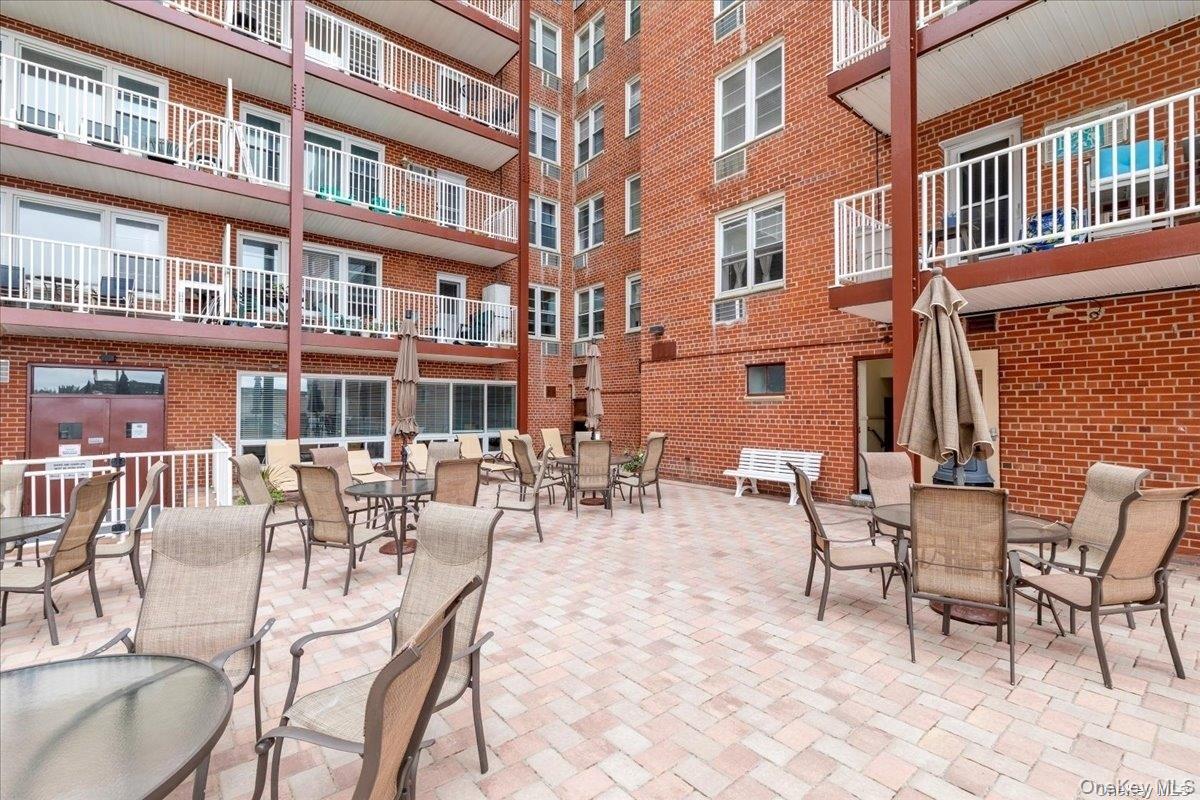 666 Shore Road, Unit 6M Long Beach, NY 11561 - Photo 20 of 24 a view of an outdoor seating area