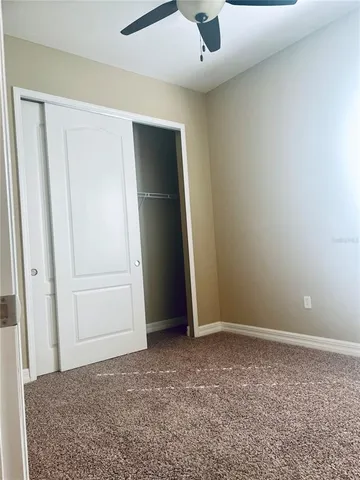 an empty room with closet