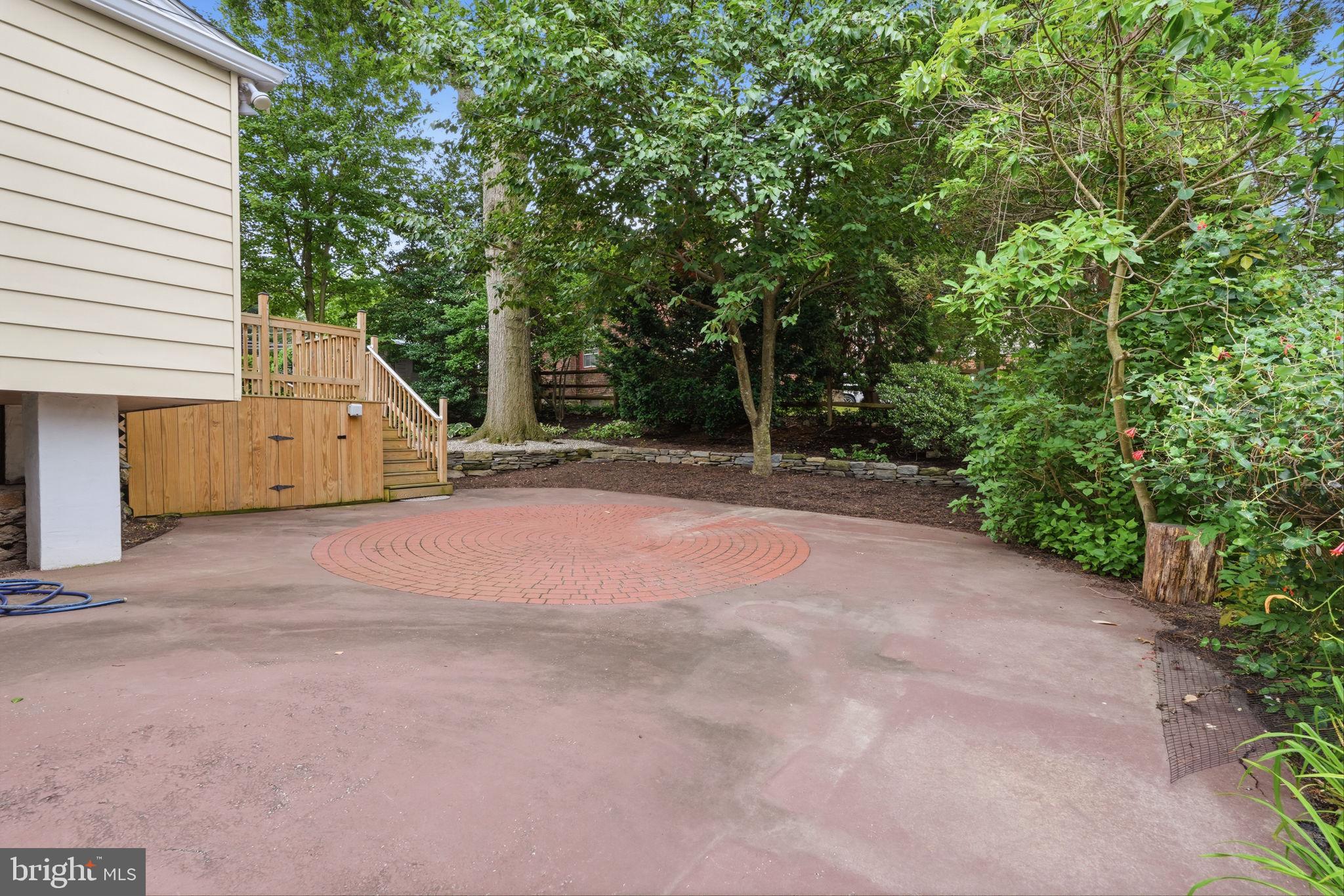 404 Old Farm Road Wyncote, PA 19095 - Photo 35 of 41 Serene outdoor space with lush greenery.
