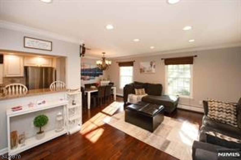 11A South Maple Avenue, Unit B Park Ridge, NJ 07656 - Photo 12 of 16 a living room with furniture and a wooden floor