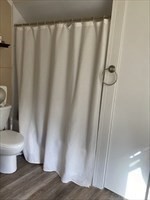 877 High Street Fall River, MA 02720 - Photo 17 of 26 a view of a bathroom with a sink and toilet