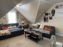 877 High Street Fall River, MA 02720 - Photo 18 of 26 a bedroom with furniture and a couch