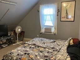 877 High Street Fall River, MA 02720 - Photo 20 of 26 a bedroom with a bed and a window