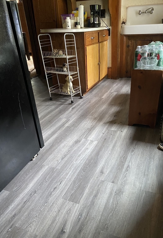 877 High Street Fall River, MA 02720 - Photo 23 of 26 a view of an empty room with wooden floor and a window