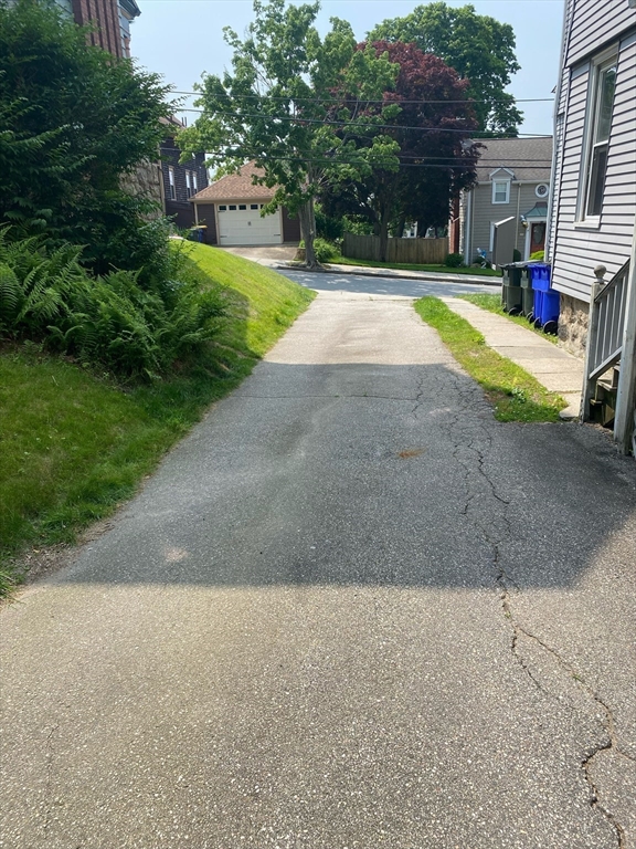 877 High Street Fall River, MA 02720 - Photo 3 of 26 a view of house with outdoor space and parking