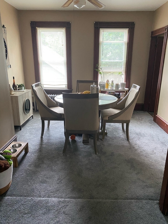 877 High Street Fall River, MA 02720 - Photo 7 of 26 a dining room with furniture and a window