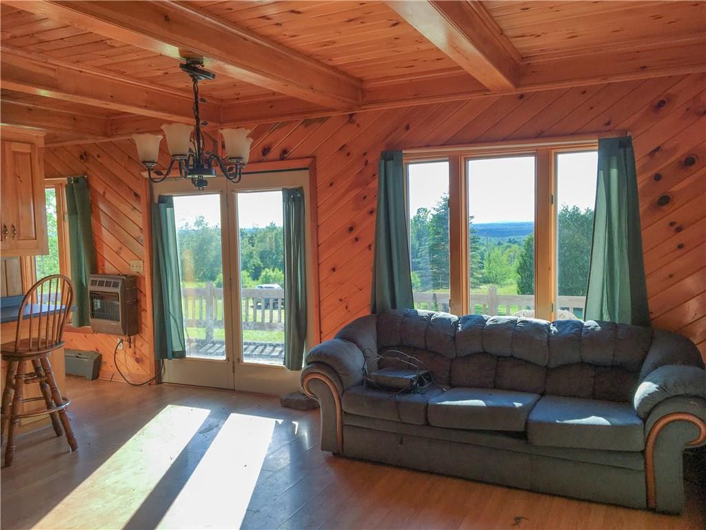552 Enfield Road Lincoln, ME 04457 - Photo 10 of 35 Dining/lounge area with mountain...
